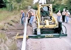 under guard skid steer|under guardrail sidedozer.